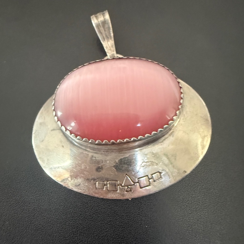 Navajo sterling silver and rose quartz pendant